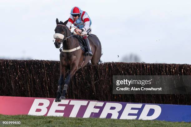 Aidan Coleman riding Saint Calvados clear the last to win The Betfred Mobile Novices' Limited Handicap Chase at Newbury racecourse on January 17,...