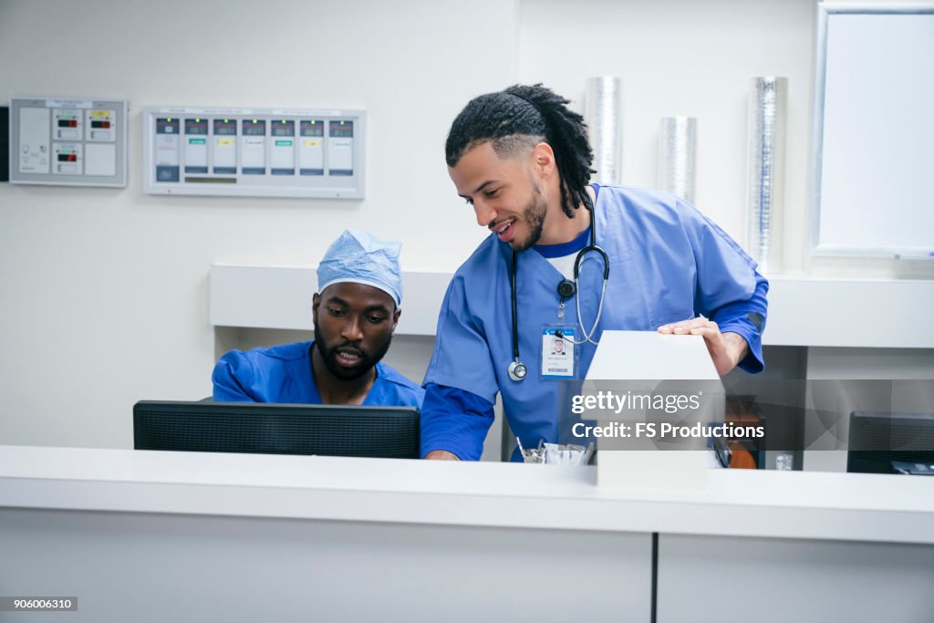 Nurse Ringing Computer Nurses Using Computer In Hospital High-Res Stock Photo - Getty Images