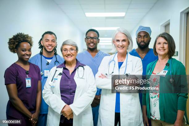 portrait of smiling medical team - medical occupation ストックフォトと画像
