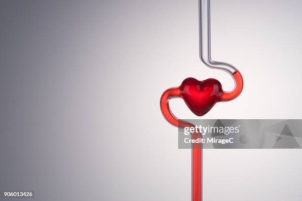 blood vessel and heart abstract - blutspende stock-fotos und bilder