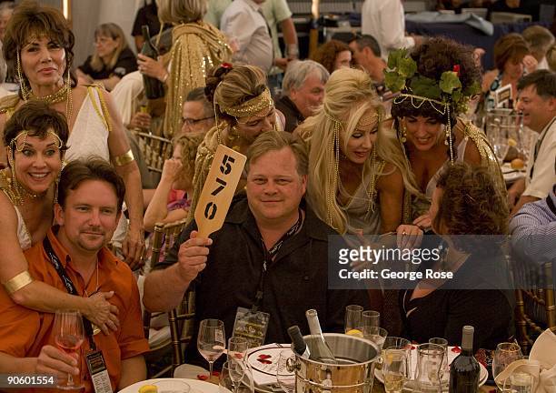 Trilogy Glass owners Greg Windisch and Rick Miron celebrate a winning bid at the 17th Annual Sonoma Valley Harvest Wine Auction as seen in this 2009...