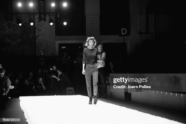 Image has been converted to black and white.) A Model walks the runway ahead of the Maisonnoee show during the MBFW January 2018 at ewerk on January...