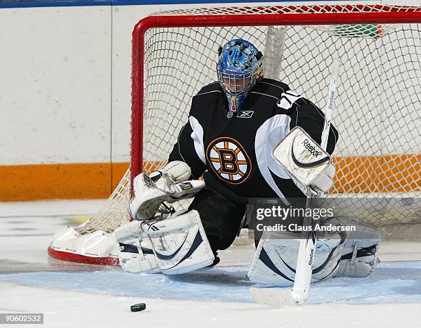 Goaltender Michael Hutchinson of the Boston Bruins maeks a save during a game against the Ottawa Senators in the NHL Rookie Tournament on September...