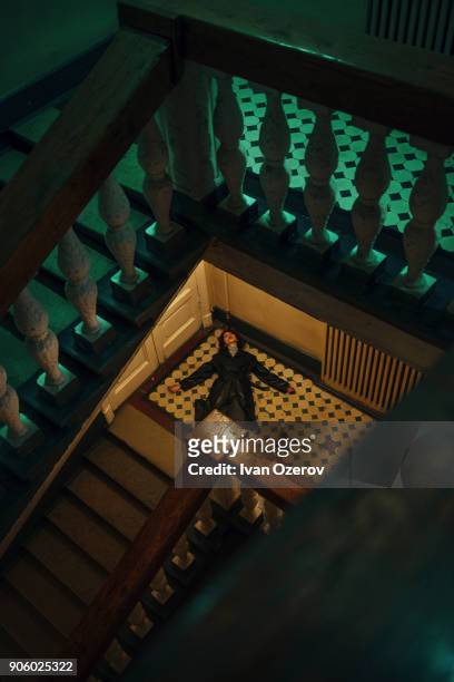 caucasian woman laying on staircase - leningrad oblast stock pictures, royalty-free photos & images