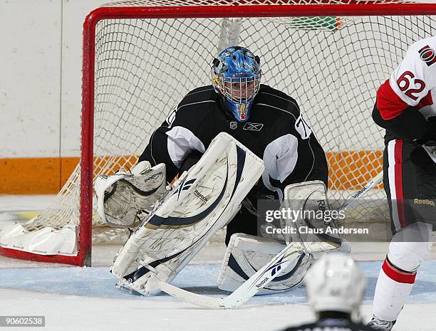 Goaltender Michael Hutchinson of the Boston Bruins defends his net during a game against the Ottawa Senators in the NHL Rookie Tournament on...