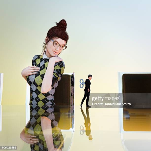 businesswoman watching windup businessman toy - wind up toy stock pictures, royalty-free photos & images