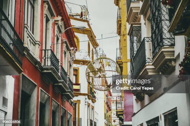 colorful street in seville, spain - seville christmas stock pictures, royalty-free photos & images