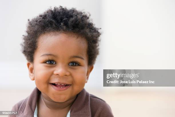 african toddler smiling - 男の赤ちゃん一人 ストックフォトと画像