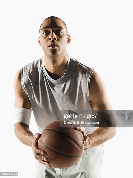 african basketball player ready to shoot basketball - man studio shot stock pictures, royalty-free photos & images