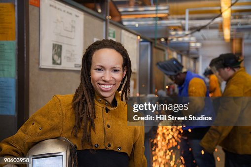 African welder smiling