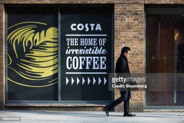 Pedestrian passes a Costa Coffee shop, operated by Whitbread Plc, in London, U.K., on Wednesday, Jan. 17, 2018. The hotel and restaurant group, that...