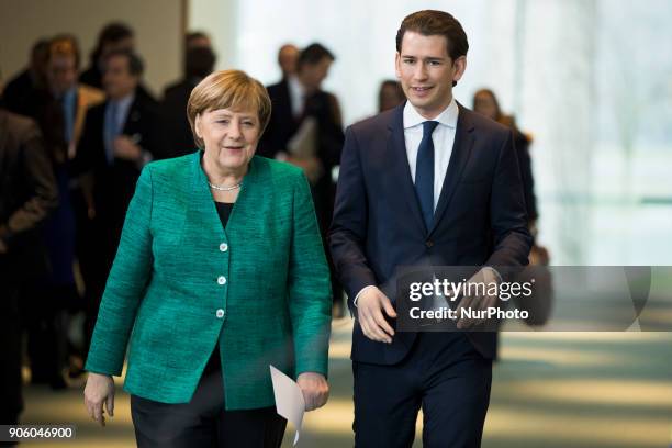 German Chancellor Angela Merkel and Austrian Chancellor Sebastian Kurz arrive to a press conference at the Chancellery in Berlin, Germany on January...