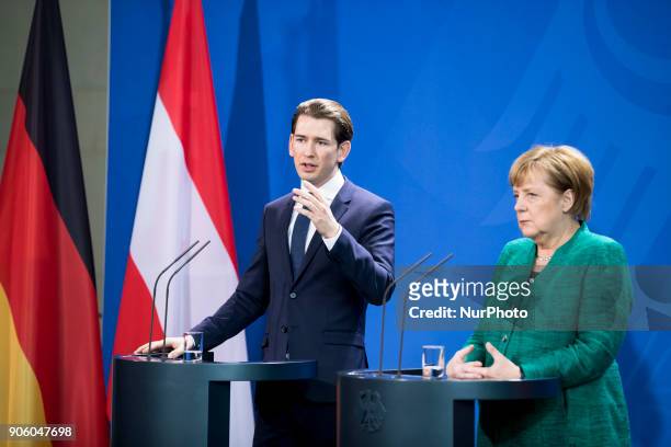 German Chancellor Angela Merkel and Austrian Chancellor Sebastian Kurz are pictured during a press conference at the Chancellery in Berlin, Germany...