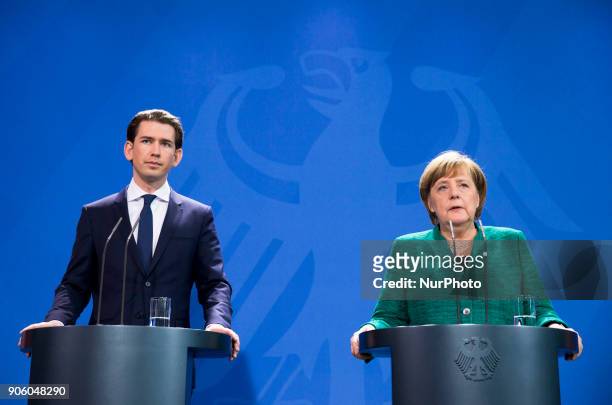 German Chancellor Angela Merkel and Austrian Chancellor Sebastian Kurz are pictured during a press conference at the Chancellery in Berlin, Germany...