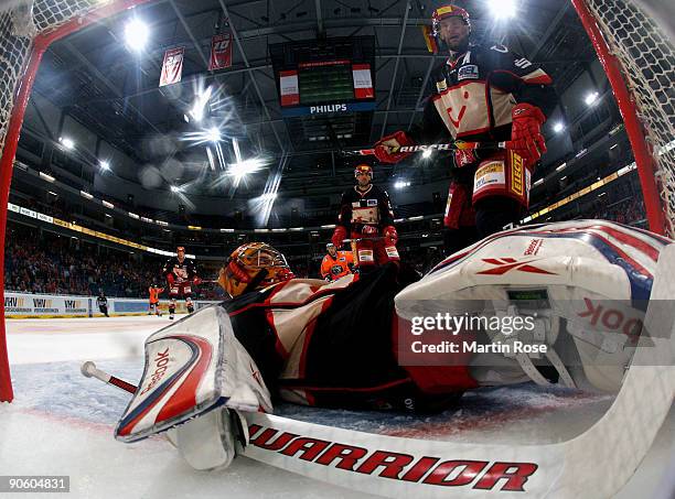 Goalkeeper Levente Szuper of Hannover lies dejected on the ice during the DEL match between Hannover Scorpions and EHC Wolfsburg at the TUI Arena on...