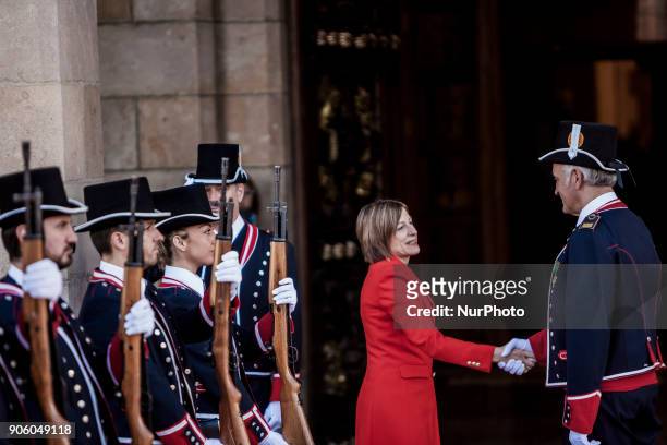 Carme Forcadell, in the center, salutes the guards chief of the Parliament of Catalonia after finishing his mandate as President of the Parliament.