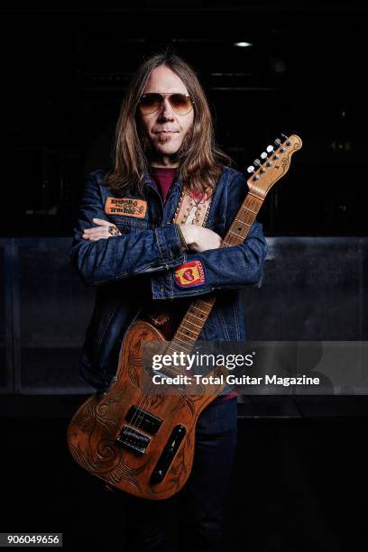 Portrait of American musician Charlie Starr, guitarist and vocalist of country rock group Blackberry Smoke, photographed backstage before a live...