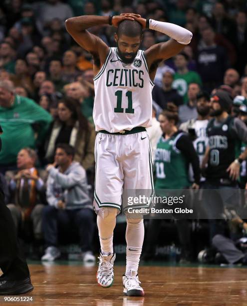 Boston Celtics' Kyrie Irving reacts after missing a three point attempt to tie the game with under five seconds left in overtime. The Boston Celtics...