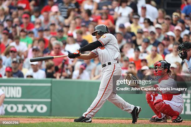 Melvin Mora of the Baltimore Orioles bats during a MLB game against the Boston Red Sox at Fenway Park on July 26, 2009 in Boston, Massachusetts.