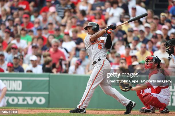 Melvin Mora of the Baltimore Orioles bats during a MLB game against the Boston Red Sox at Fenway Park on July 26, 2009 in Boston, Massachusetts.