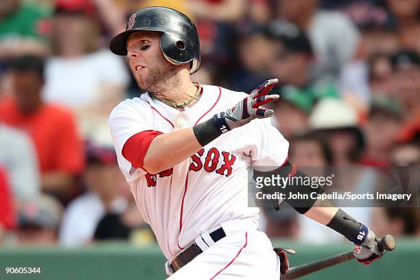 Dustin Pedroia of the Boston Red Sox bats during a MLB game against the Baltimore Orioles at Fenway Park on July 26, 2009 in Boston, Massachusetts.