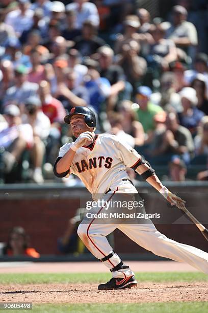 Freddy Sanchez of the San Francisco Giants swings at a pitch during the game against the Los Angeles Dodgers at AT&T Park on August 12, 2009 in San...