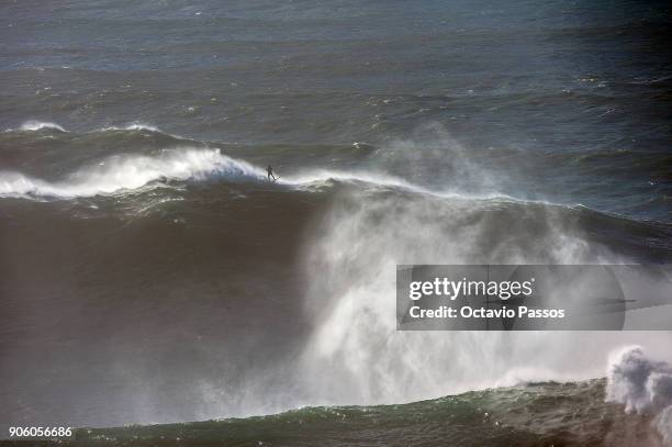 German big wave surfer Sebastian Steudtner, drops a wave during a surf session at Praia do Norte on January 17, 2018 in Nazare, Portugal.