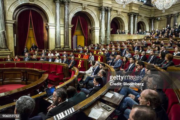 Lawmakers sit during a session of the Catalan parliament in Barcelona, Spain, on Wednesday, Jan. 17, 2018. Spanish Prime Minister Mariano Rajoy saw...