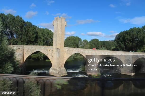 medieval bridge of frías. burgos province, castilla y león, spain. - león province spain stock-fotos und bilder