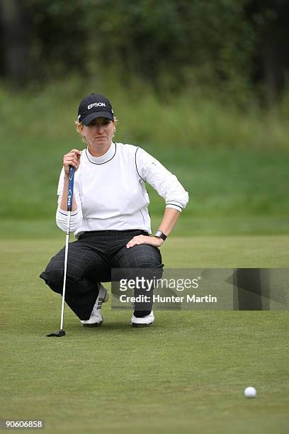 Karrie Webb lines up her putt during the final round of the Canadian Women's Open at Priddis Greens Golf & Country Club on September 6, 2009 in...