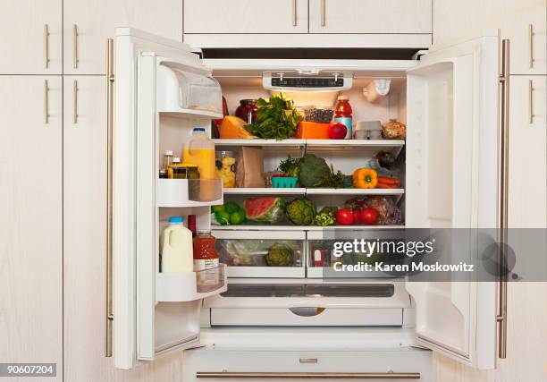 view of inside of refrigerator with healthy food - refrigerator ストックフォトと画像