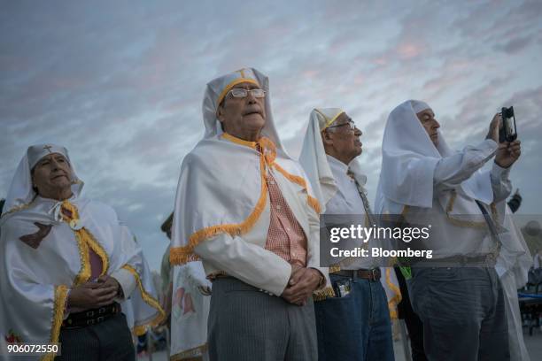 Attendees wait for Pope Francis to arrive for mass at O'Higgins Park in Santiago, Chile, on Tuesday, Jan. 16, 2018. 400,000 Chileans attended Pope...