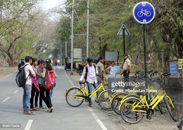 Students using OFO Cycles at SPPU Campus on January 16, 2018 in Pune, India. Chinese bicycle sharing service Ofo has launched its service in seven...