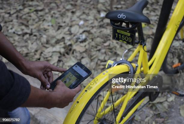 Students using OFO Cycles at SPPU Campus on January 16, 2018 in Pune, India. Chinese bicycle sharing service Ofo has launched its service in seven...