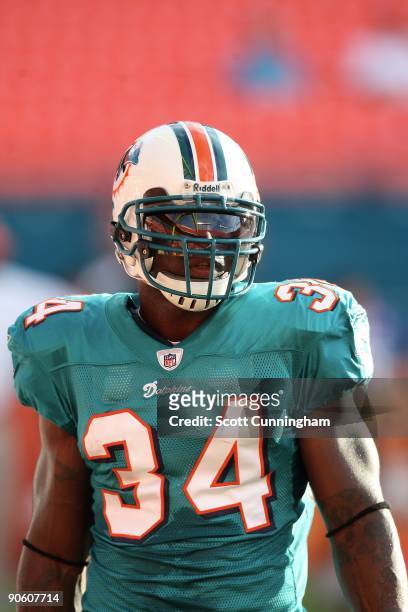 Ricky Williams of the Miami Dolphins warms up before the preseason game against the Jacksonville Jaguars at Landshark Stadium on August 17, 2009 in...
