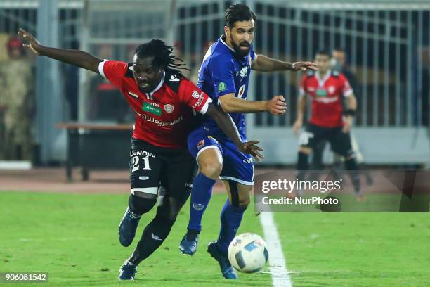 Al-ahly's Abduallah Said and Al-Gish Franck Engonga in Action during the Egypt Primer League Fixtures 18 Match Between Al-Ahly and Al-Gish , in Cairo...
