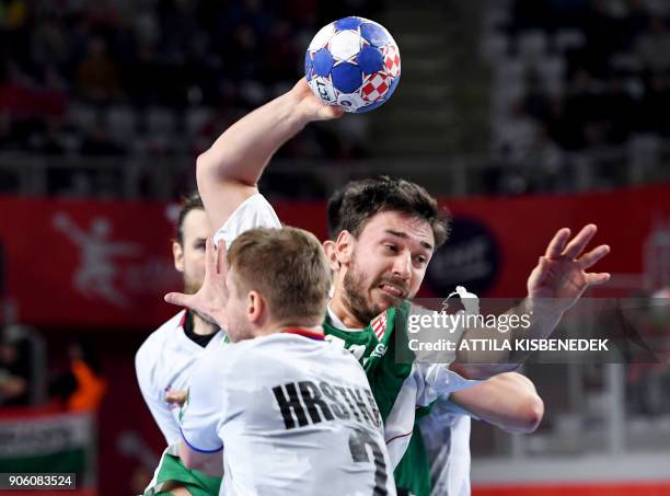 Hungary's Mate Lekai scores a goal against Czech Republic's Jakub Hrstka in Varazdin Arena on January 17, 2018 during their group 'D' match of the...