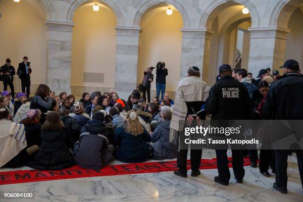 Capitol Hill police arrest Jewish activists protesting for passage of a clean DACA bill on Capitol Hill on January 17, 2018 in Washington, DC....