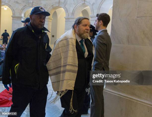 Capitol Hill police arrest Jewish activists protesting for passage of a clean DACA bill on Capitol Hill on January 17, 2018 in Washington, DC....
