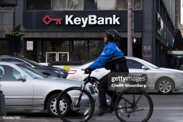 Traffic passes in front of the KeyBank building in Columbus, Ohio, U.S., on Jan. 9, 2018. KeyCorp is scheduled to release earnings figures on January...