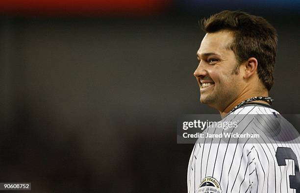 Nick Swisher of the New York Yankees smiles while standing at first base during the game against the Tampa Bay Rays on September 9, 2009 at Yankee...