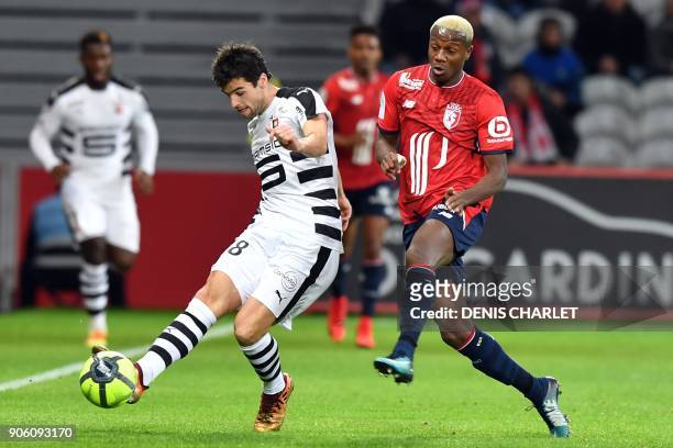 Rennes' French midfielder Yoann Gourcuff outruns Lille's Moroccan defender Hamza Mendyl during the French L1 football match between Lille and Rennes...