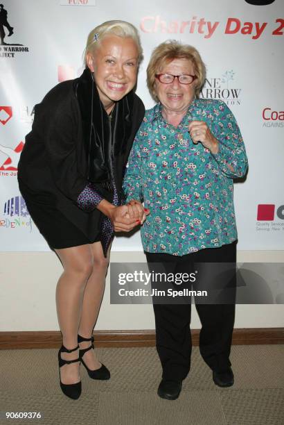 Professional Skater Oksana Baiul and TV Personality Dr. Ruth Westheimer attends the 5th annual BGC Charity Day at BGC Partners, INC on September 11,...