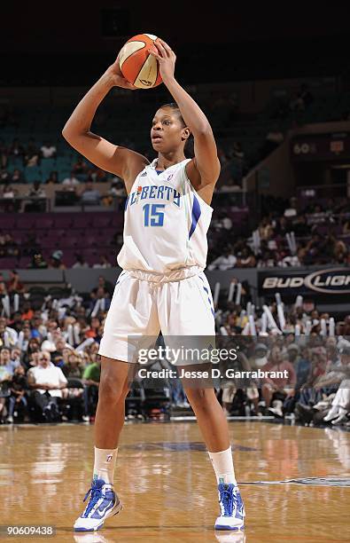 Kia Vaughn of the New York Liberty looks to move the ball against the Seattle Storm during the game on September 1, 2009 at Madison Square Garden in...