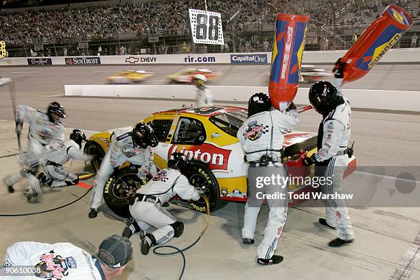 Brad Keselowski, driver of the Lipton Chevrolet, makes a pit stop during the NASCAR Nationwide Series Virginia 529 College Savings Plan 250 at...