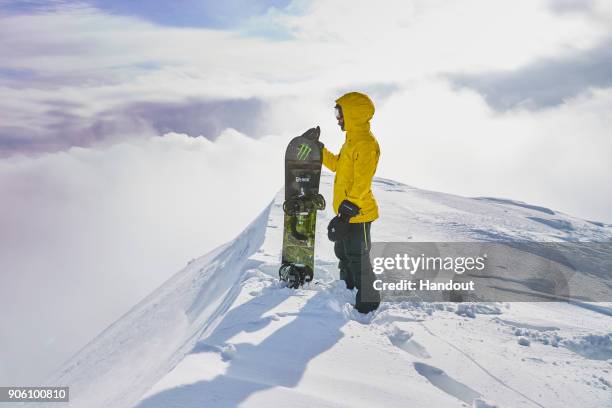 In this handout image provided by Monster Energy, Four-time F1 World Champion Lewis Hamilton hones his snowboarding skills with some of the world's...