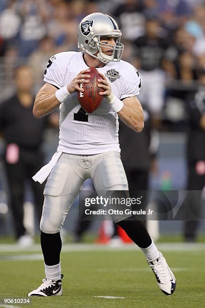 Quarterback Jeff Garcia of the Oakland Raiders drops back to pass during the game against the Seattle Seahawks on September 3, 2009 at Qwest Field in...