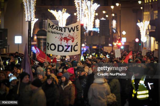 Thousands of women march in a protest of a new abortion law proposal in Warsaw, Poland on January 17, 2018. The new proposal would ban the abortion...