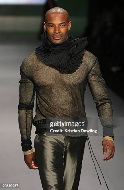 Model Tyson Beckford walks the runway wearing David Tlale at This Day/Arise: African Fashion Collective 2010 Fashion Show at the Promenade at Bryant...