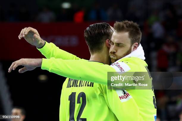 Goalkeepers Silvio Heinevetter of Germany and Andreas Wolff of Germany react during the Men's Handball European Championship Group C match between...